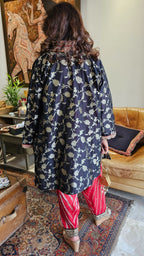 Fusion of Tissue and Banarasi Silk Kurta in Banarasi Silk Jaal With Silk Tissue Bottom in Contrasting Red With Embroidered Poncha