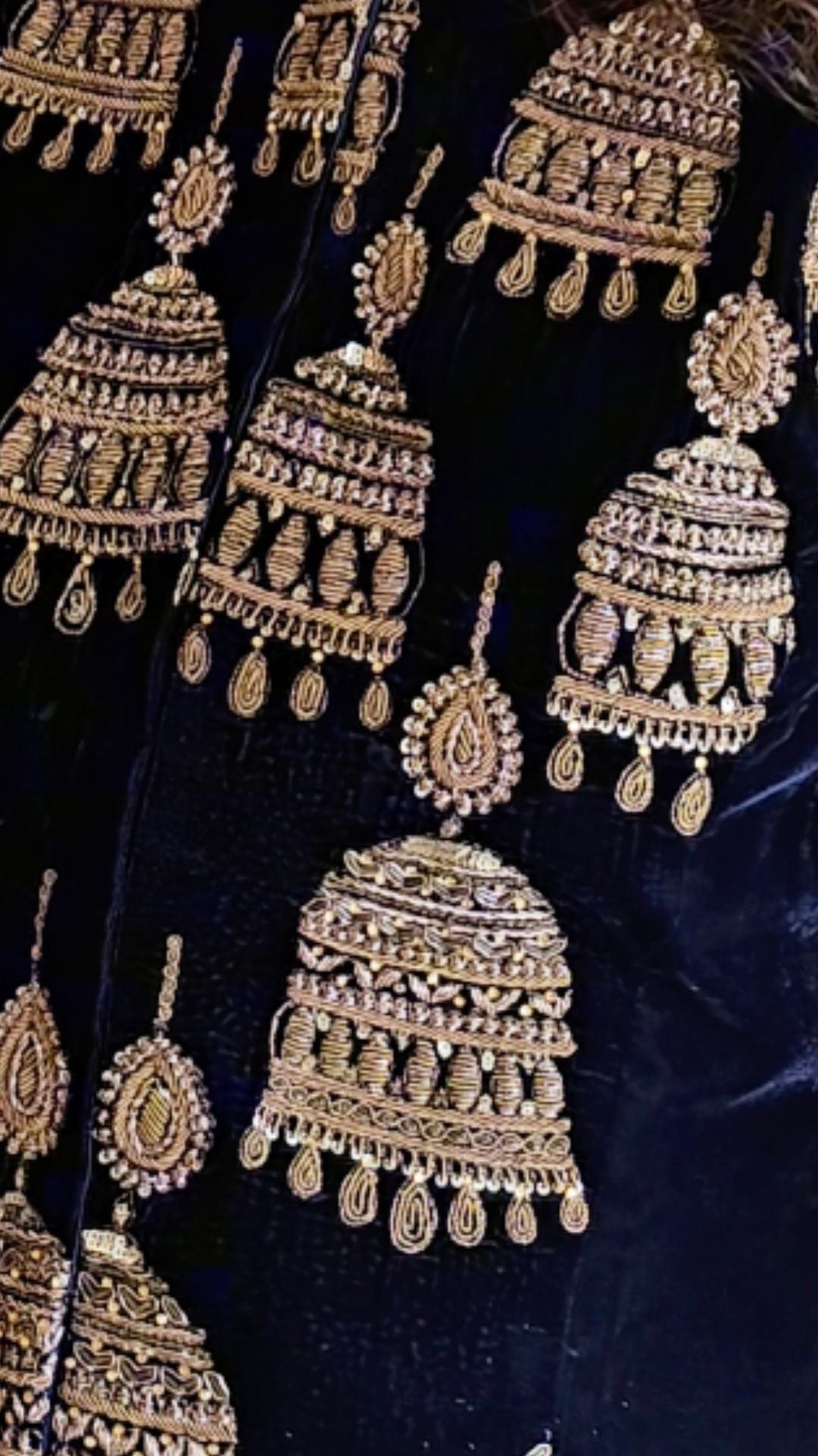 A beautiful velvet hand embroidered Zardozi jacket with satin drape skirt