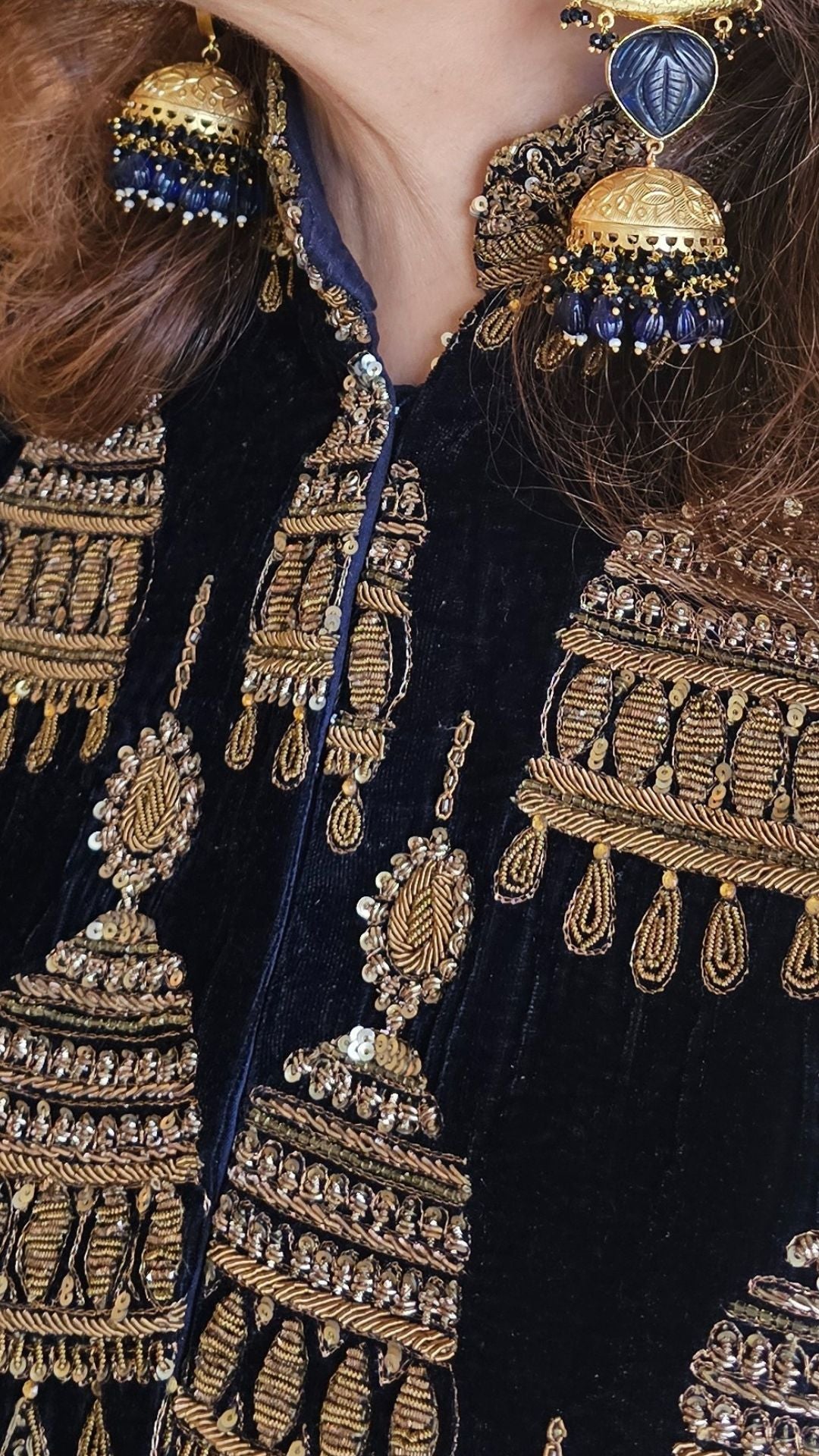 A beautiful velvet hand embroidered Zardozi jacket with satin drape skirt