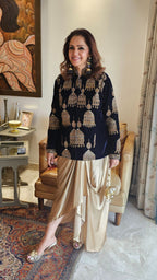 A beautiful velvet hand embroidered Zardozi jacket with satin drape skirt